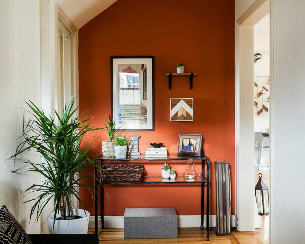 Bold entryway with Orange accent wall 11zon 1